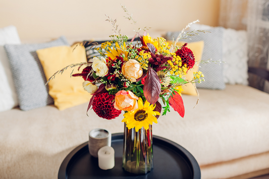 A fresh flower bouquet arranged on a table, representing thoughtful winter flower gifting in January
